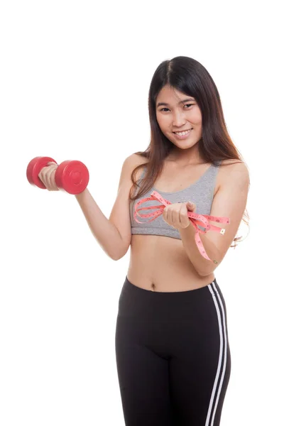 Beautiful Asian healthy girl with dumbbell and measuring tape. — Stock Photo, Image