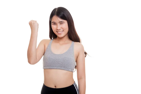 Éxito joven mujer asiática en vestidos de deporte mantenga el puño en alto . — Foto de Stock