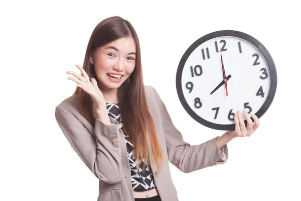 Happy Young Asian woman with a clock. — Stock Photo, Image