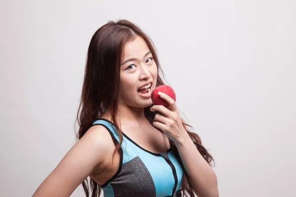 Mooie Aziatische gezond meisje eet appel. — Stockfoto