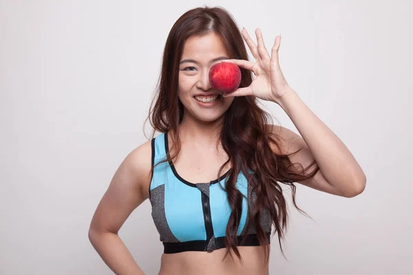 Mooie Aziatische gezond meisje met apple. — Stockfoto