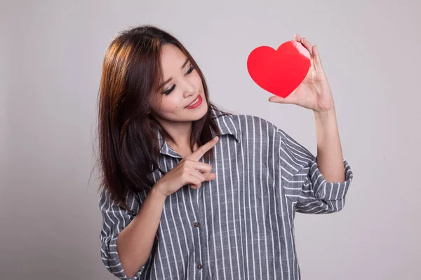 Asian woman point to red heart. — Stock Photo, Image