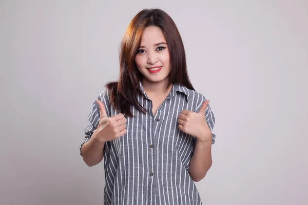 Young Asian woman show two thumbs up. — Stock Photo, Image