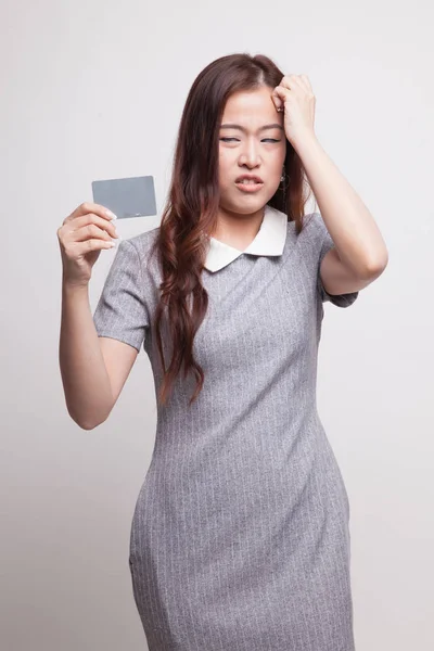 Young Asian woman headache with a blank card. — Stock Photo, Image