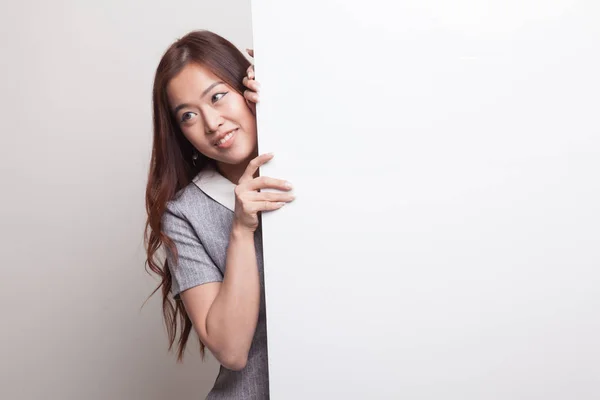 Young Asian woman with blank sign. — Stock Photo, Image