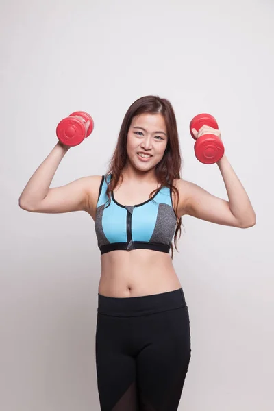Gyönyörű ázsiai egészséges lány súlyzó edzés. — Stock Fotó
