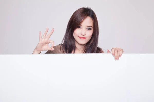 Young Asian woman show OK with blank sign. — Stock Photo, Image