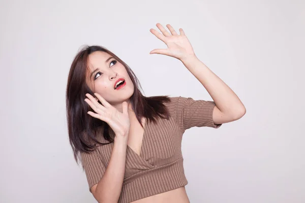 Excited young Asian woman look up. — Stock Photo, Image