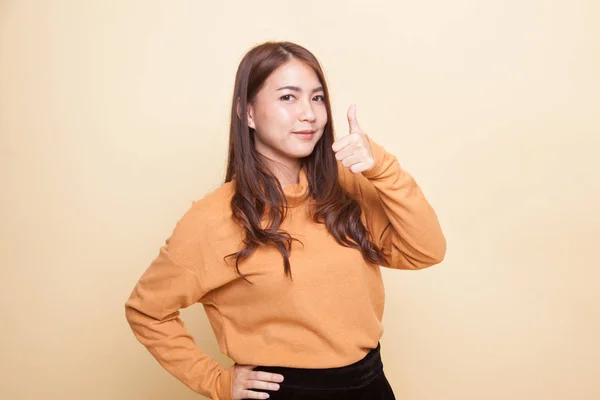 Young Asian woman show thumbs up. — Stock Photo, Image