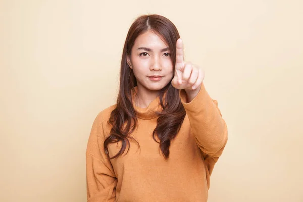 Asian woman touching the screen with finger. — Stock Photo, Image