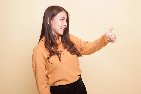 Asian woman thumbs up  and smile. — Stock Photo, Image