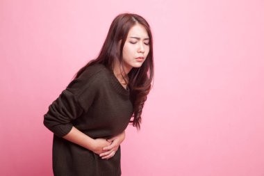 Young Asian woman got stomachache. clipart