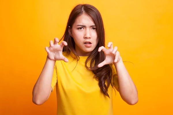 Young Asian woman with spooky hands gesture. — Stock Photo, Image