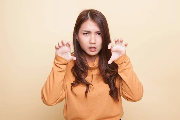 Young Asian woman with spooky hands gesture. — Stock Photo, Image