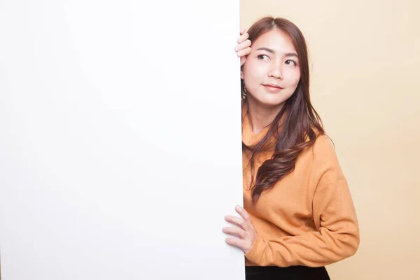 Young Asian woman with blank sign. — Stock Photo, Image