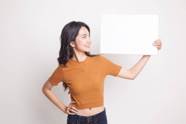 Beyaz boş işareti ile genç Asyalı kadın.