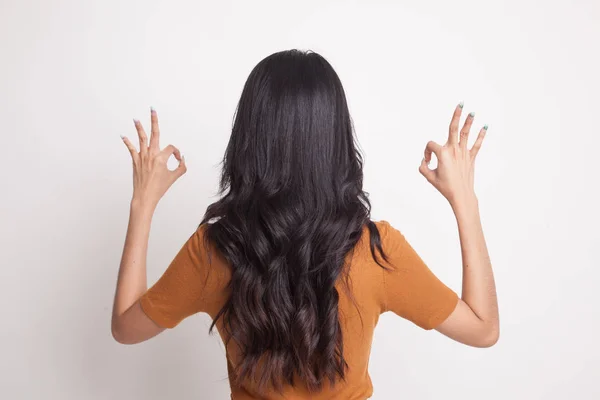 Back view of Asian woman show double OK hand sign. — Stock Photo, Image