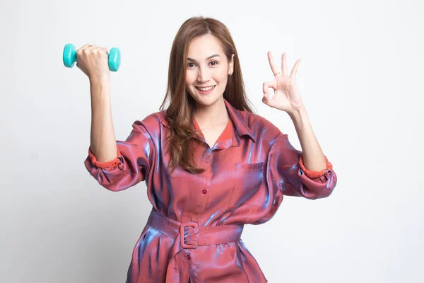 Healthy Asian woman show OK with dumbbells. — Stock Photo, Image