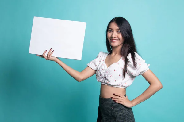 Young Asian woman with  white blank sign . — Stock Photo, Image