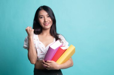 Genç Asyalı kadın ile eğitim kitap olabilir .