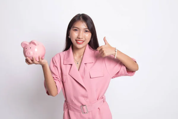 아시아 여자 돼지 동전 은행 엄지손가락. — 스톡 사진