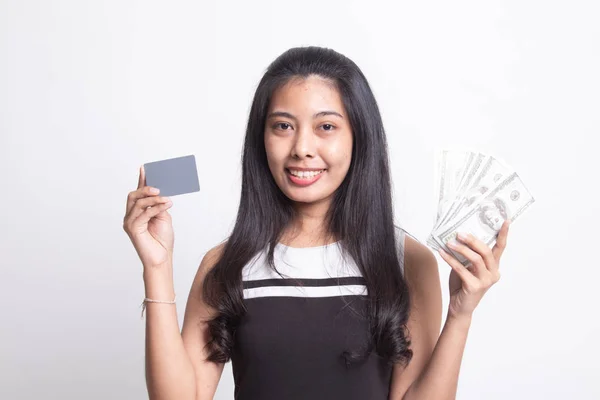 Portret van een jonge Aziatische vrouw met veel bankbiljetten — Stockfoto