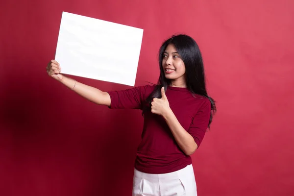 Jovem ásia mulher mostrar polegares até com branco branco branco sinal . — Fotografia de Stock