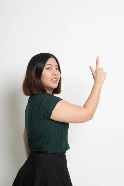 Dos de femme asiatique touchant l'écran avec son doigt — Photo