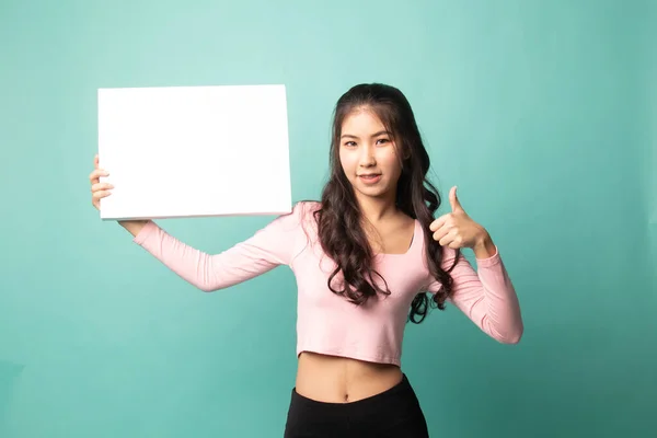 Young Asian Woman Show Thumbs White Blank Sign Cyan Background — Stock Photo, Image