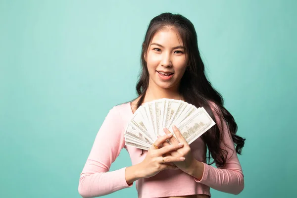 Portrait Young Asian Woman Showing Bunch Money Banknotes Cyan Background — Stock Photo, Image