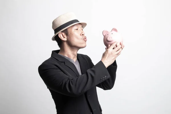 Dospělý Asijské Člověk Políbit Růžové Mince Banka Bílém Pozadí — Stock fotografie