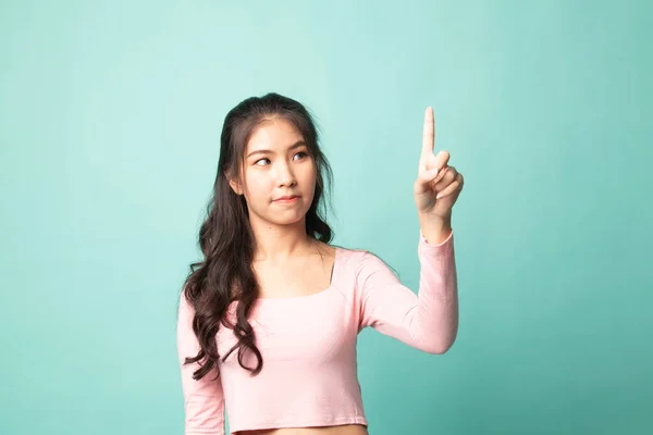 Mujer Asiática Tocando Pantalla Con Dedo Sobre Fondo Cian —  Fotos de Stock