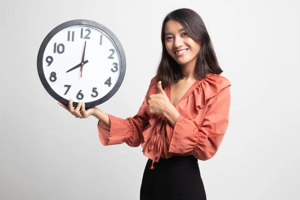 Young Asian Woman Thumbs Clock White Background — Stock Photo, Image