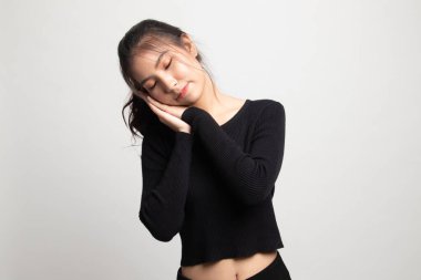 Jest beyaz arka plan üzerinde uyku ile güzel genç Asyalı kadın