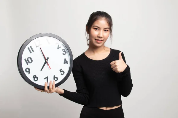 Young Asian Woman Thumbs Clock White Background — Stock Photo, Image