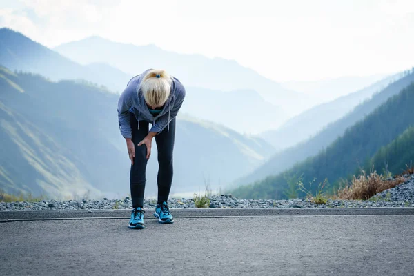 Injuries - sports running knee injury on woman.