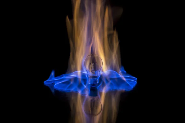 Light bulb on fire — Stock Photo, Image