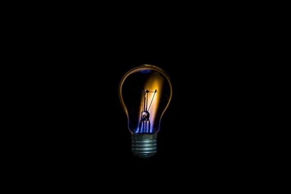 Žárovka a svíčka pojetí fúze — Stock fotografie