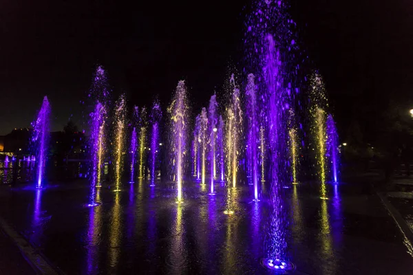 Colorfully lit fountain — Stock Photo, Image