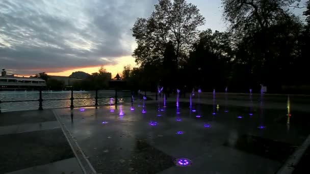 Fountain lit with rainbow colors — Stock Video