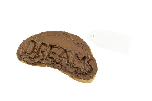 Sweet dreams concept. Chocolate spreaded on a bread — Stock Photo, Image