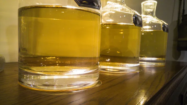 Jars of unblended whiskey. — Stock Photo, Image