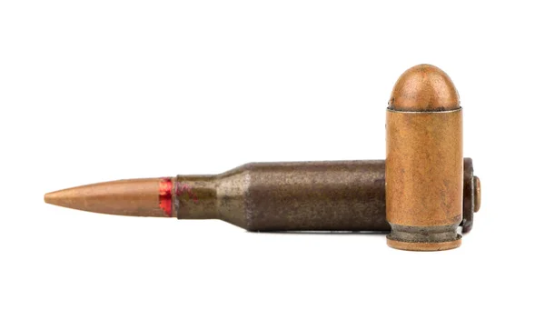 Kulka z pistole a Ak-47 — Stock fotografie