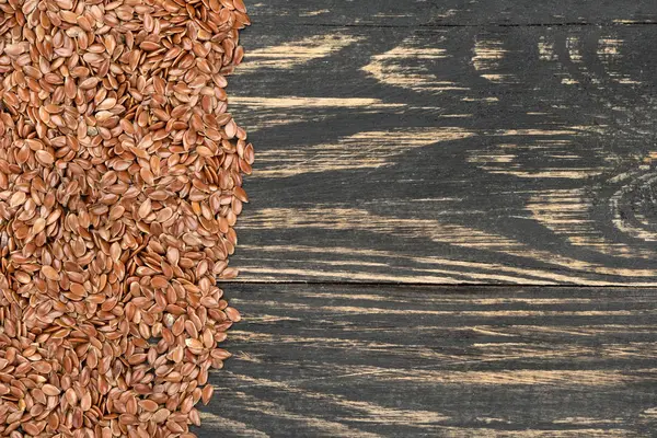 Rozrzucone nasiona lnu — Zdjęcie stockowe