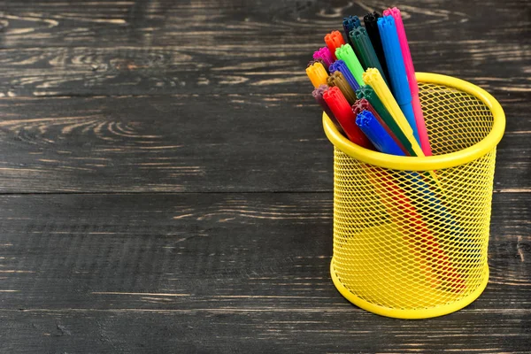 Multicolored markers in basket — Stock Photo, Image