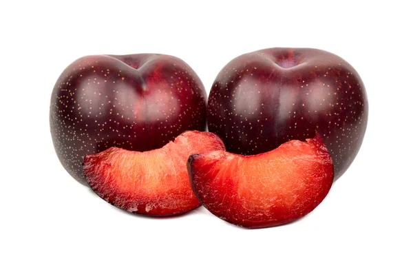 Red plum with slice — Stock Photo, Image