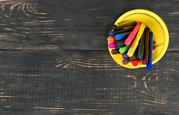 Multicolored markers in basket — Stock Photo, Image