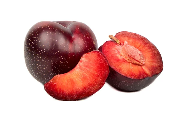 Red plum with slice — Stock Photo, Image