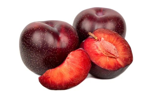 Red plum with slice — Stock Photo, Image