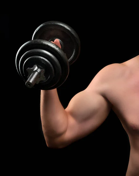 Biceps beginner bodybuilder — Stockfoto